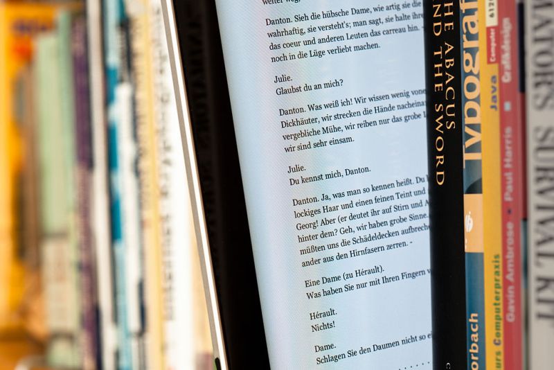 1024px-EBook_between_paper_books