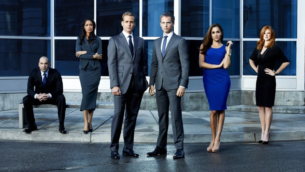SUITS -- Season: 2 -- Pictured: (l-r) Rick Hoffman as Louis Litt, Gina Torres as Jessica Pearson, Gabriel Macht as Harvey Specter, Patrick J. Adams as Mike Ross, Meghan Markle as Rachel Zane, Sarah Rafferty as Donna -- Photo by: Robert Ascroft/USA Network class="wp-image-71973" 