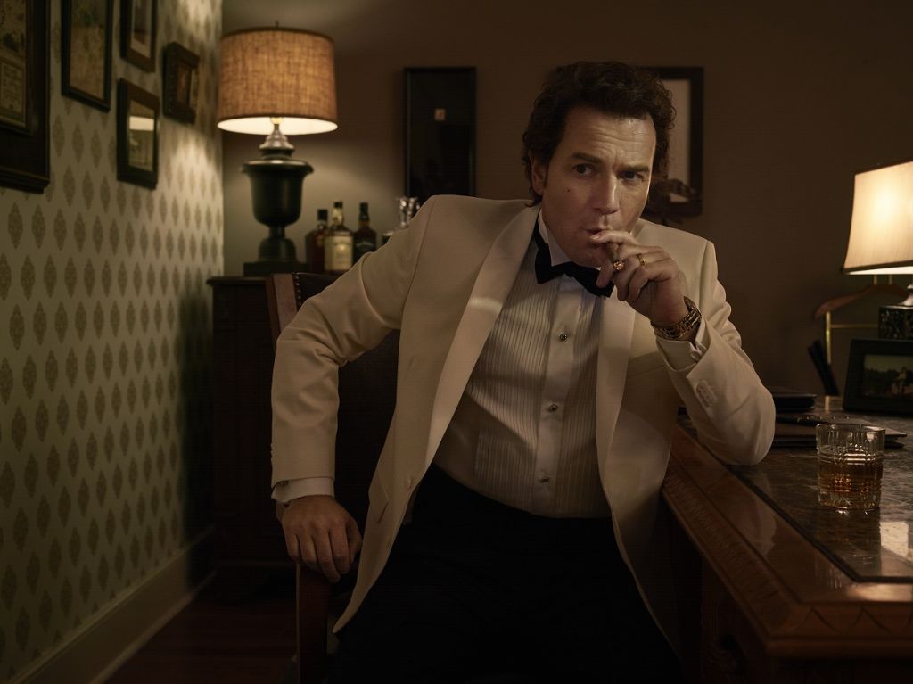 Ewan McGregor jako Emmit Stussy class="wp-image-83500" 