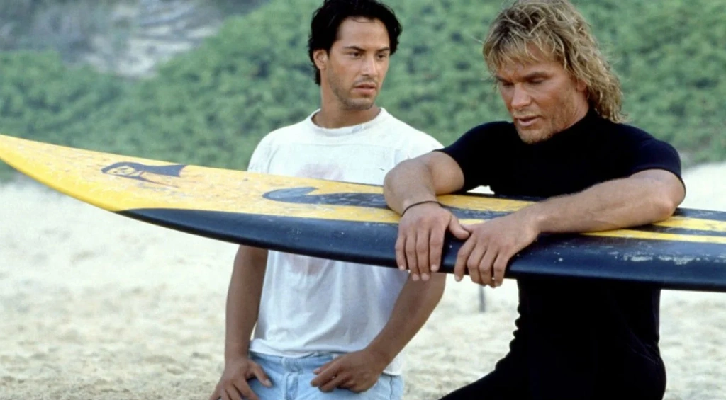 Keanu Reeves u boku Patricka Swayze w filmie Na fali